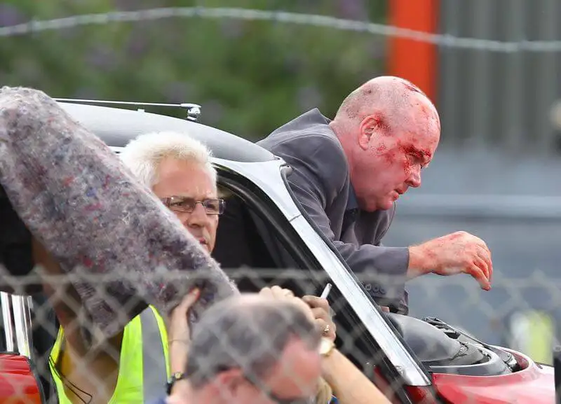 Steve McFadden (Phil Mitchell)and Daniel Coonan (Carl White) film a nasty car crash scene